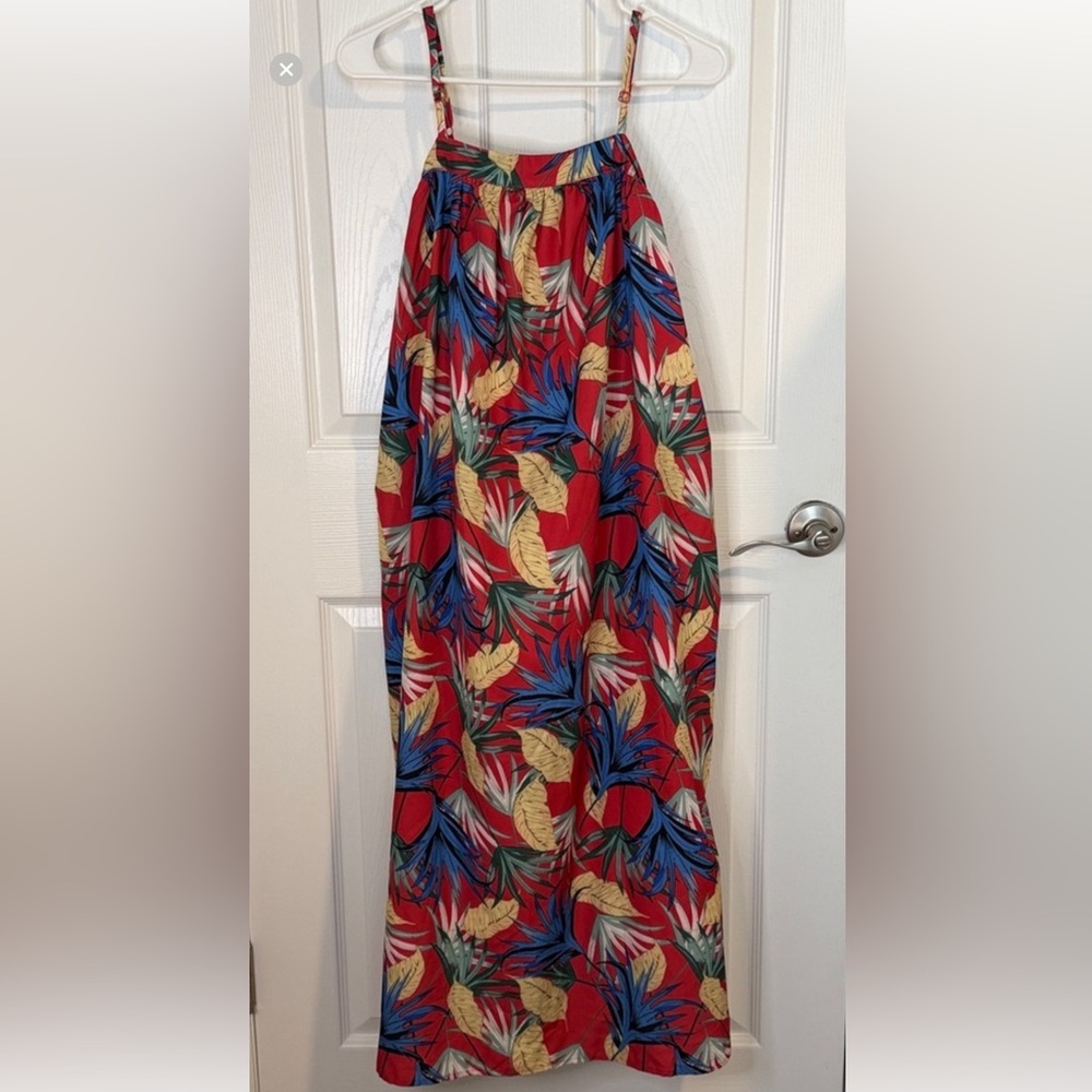 Tropical Red Maxi Sundress with Leaf Print lined inside . Adjustable straps .